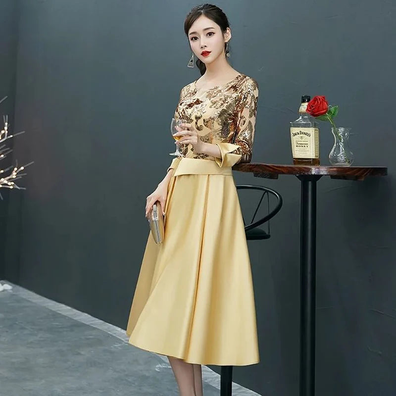 robe dorée mariage demoiselle d'honneur